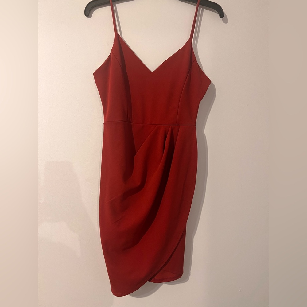 Dark orange dress. Worn only once. Size large.